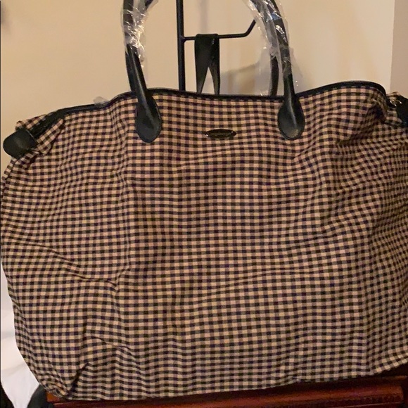Longaberger Handbags - Longaberger fold up lightweight travel tote